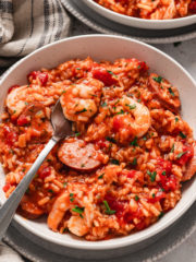 bowl of red jambalaya with shrimp and sausage