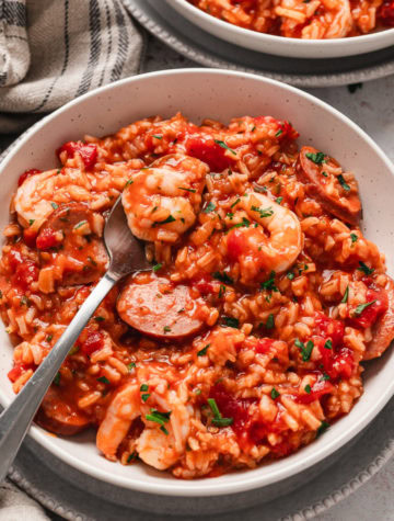 bowl of red jambalaya with shrimp and sausage