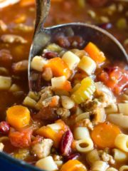 pasta soup in ladle