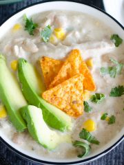 bowl of white chicken chili with toppings