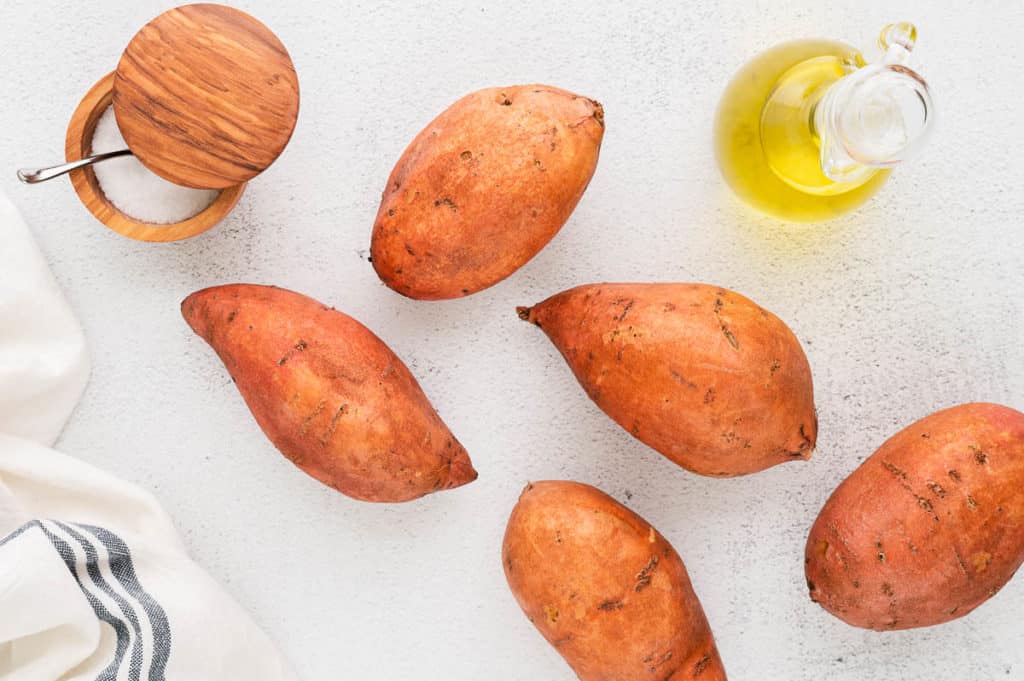 Easy Baked Sweet Potatoes - Perfect Fluffy Melt In Your Mouth!