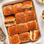 cheeseburger sliders in a baking dish