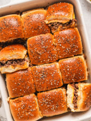 cheeseburger sliders in a baking dish