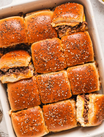 cheeseburger sliders in a baking dish